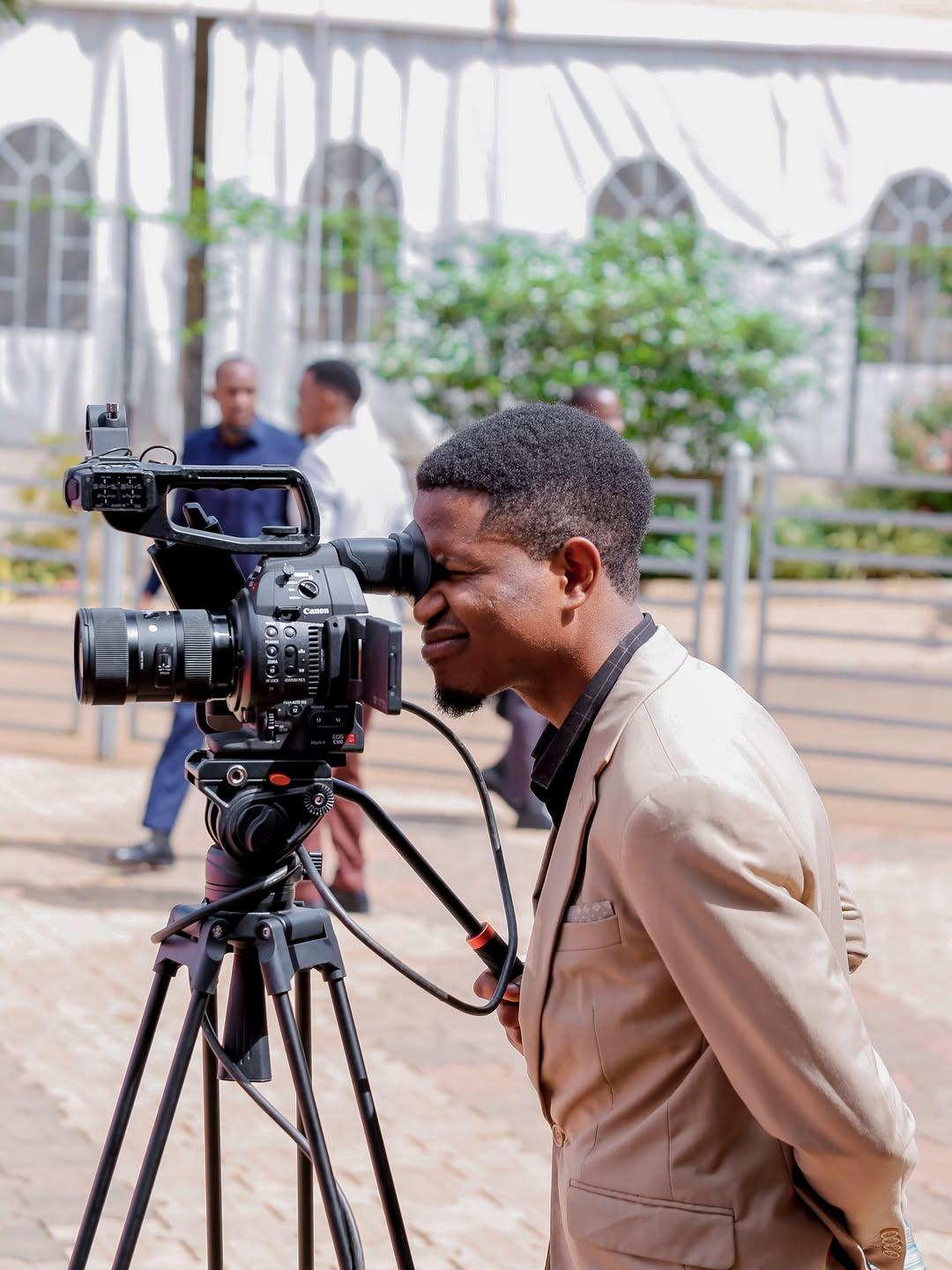 B5 Media camera operator filming outdoors